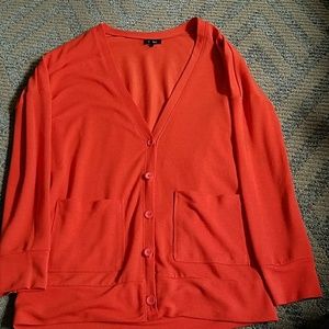 Nollie small orange button down cardigan sweater